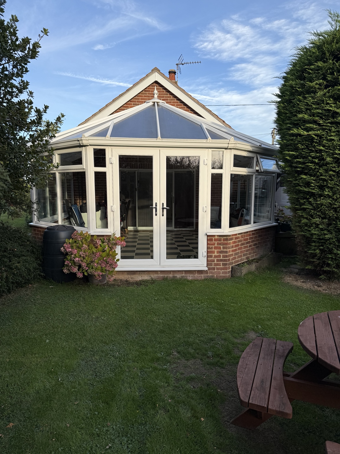 Conservatory opening onto Chelmont's garden